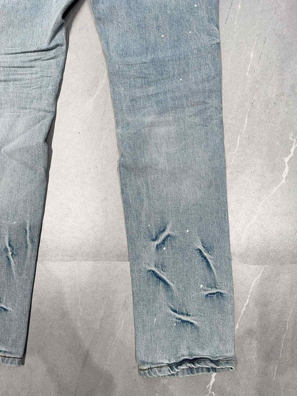 AMIRI DISTRESSED CEMENT CALIFORNIA SKINNY JEANS