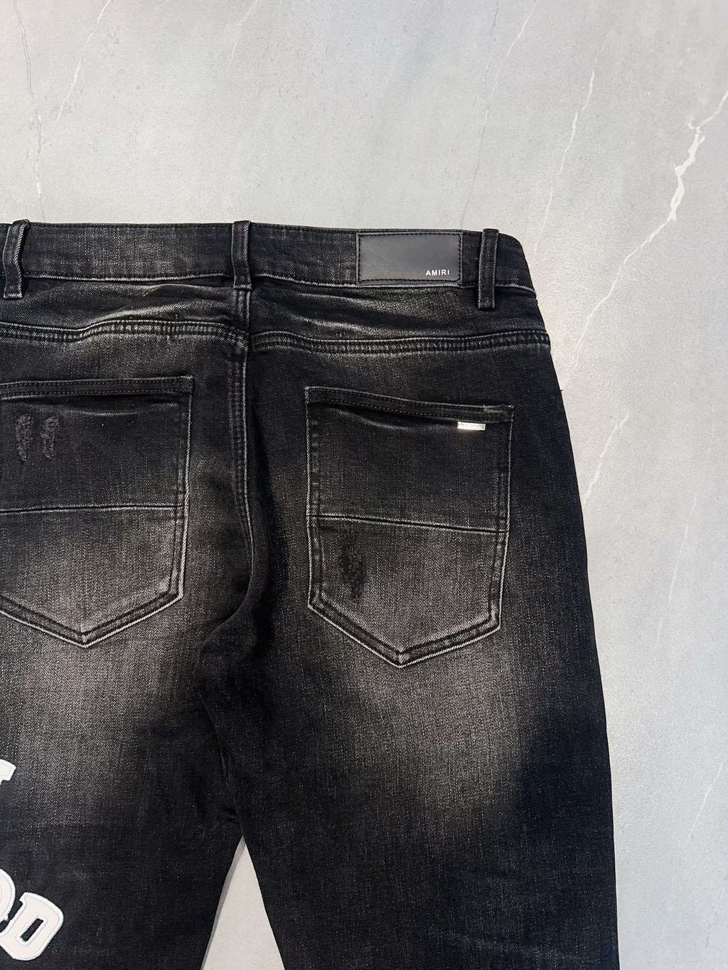 AMIRI DISTRESSED-EFFECT SKINNY JEANS