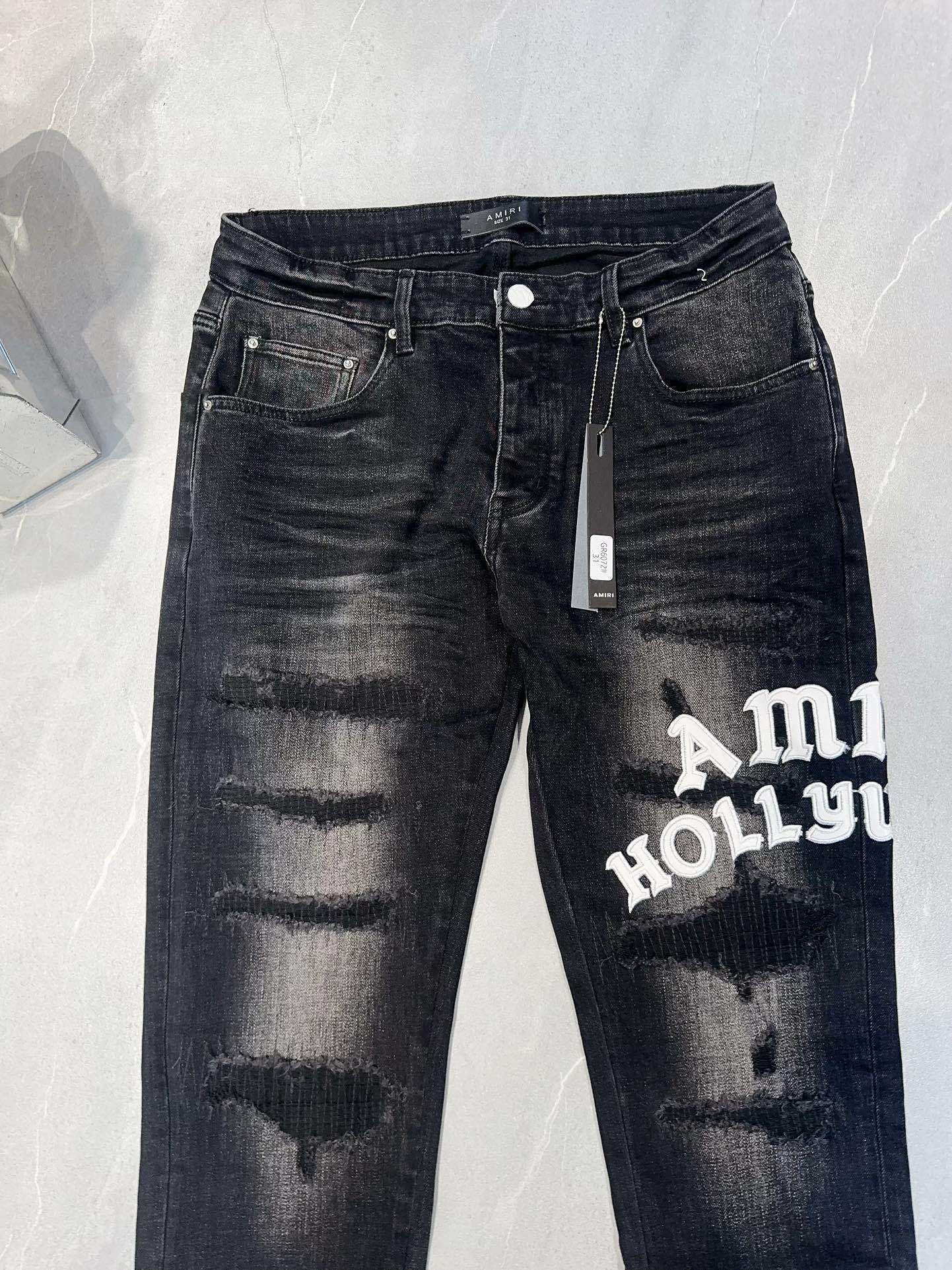 AMIRI DISTRESSED-EFFECT SKINNY JEANS