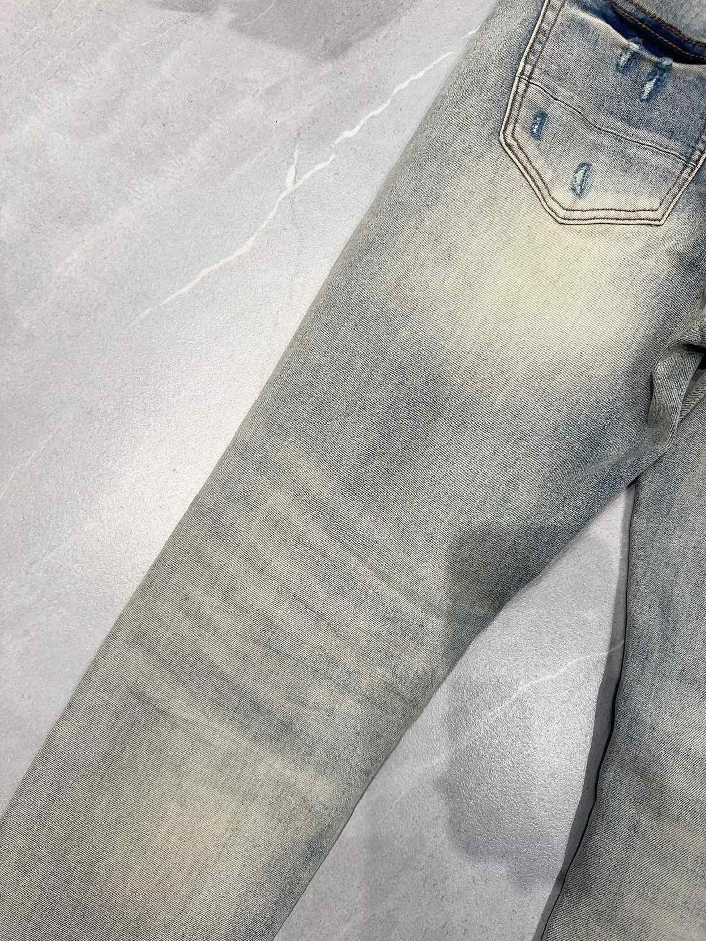AMIRI MX1 RIPPED SKINNY JEANS