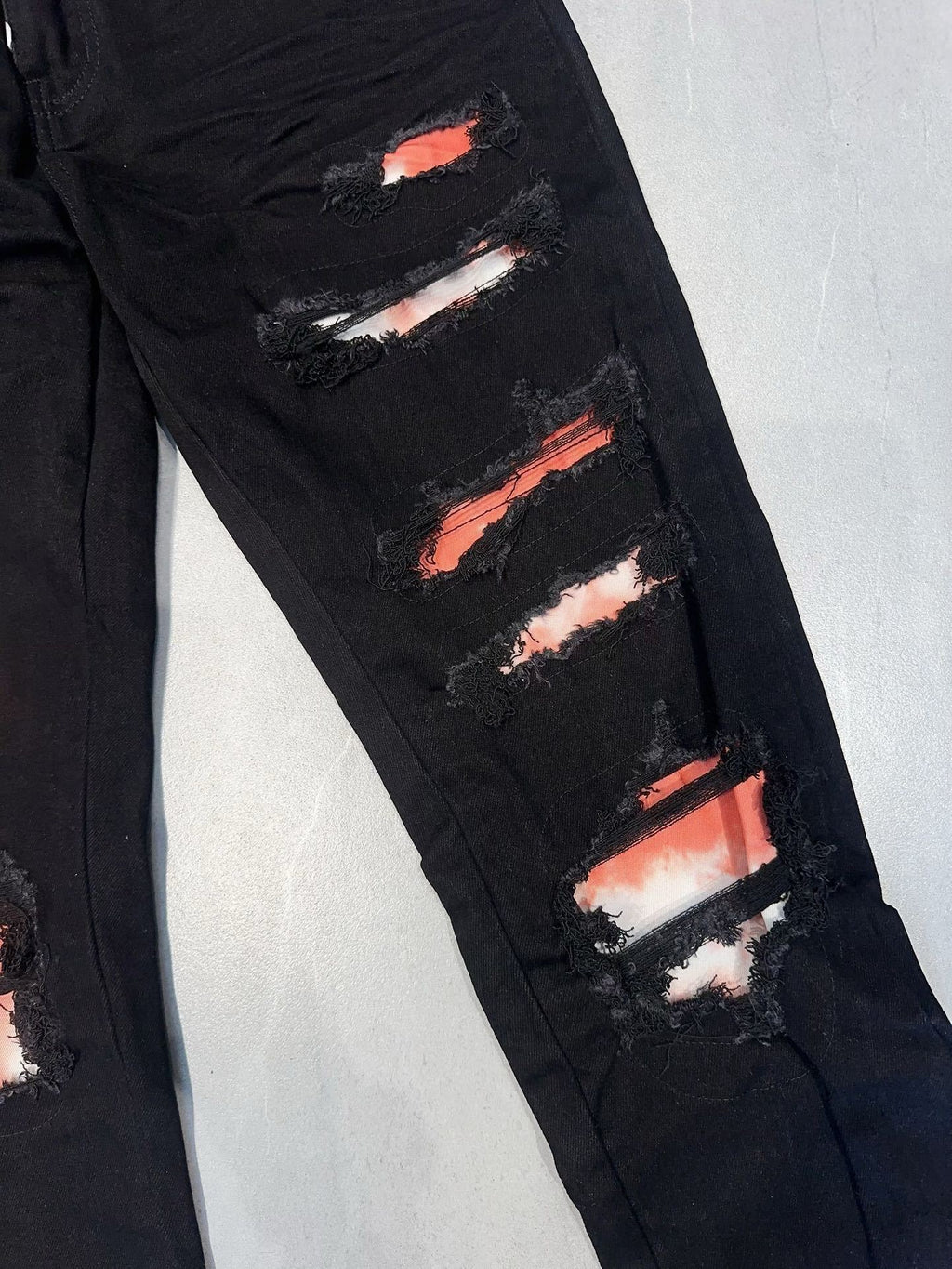 AMIRI WAXED LOGO-APPLIQUE SKINNY JEANS