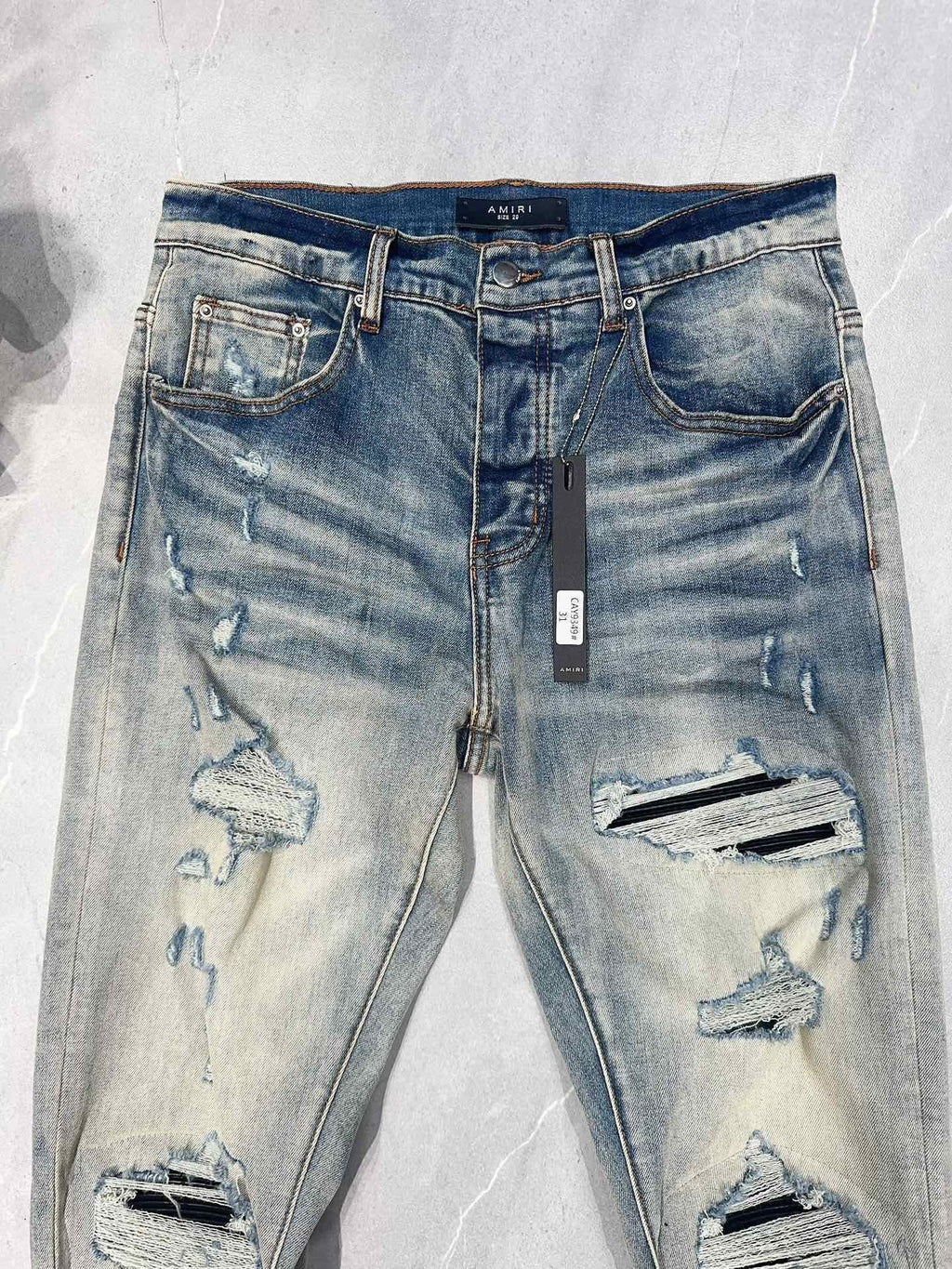 AMIRI MX1 RIPPED SKINNY JEANS