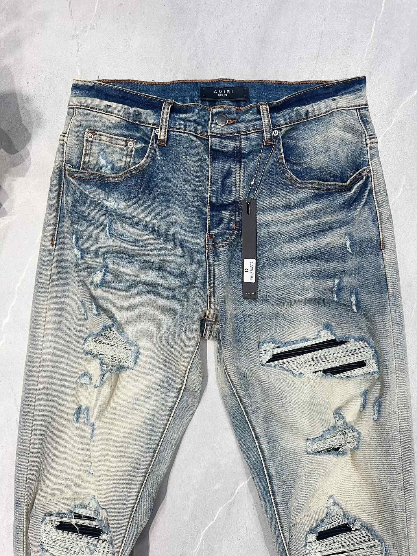 AMIRI MX1 RIPPED SKINNY JEANS