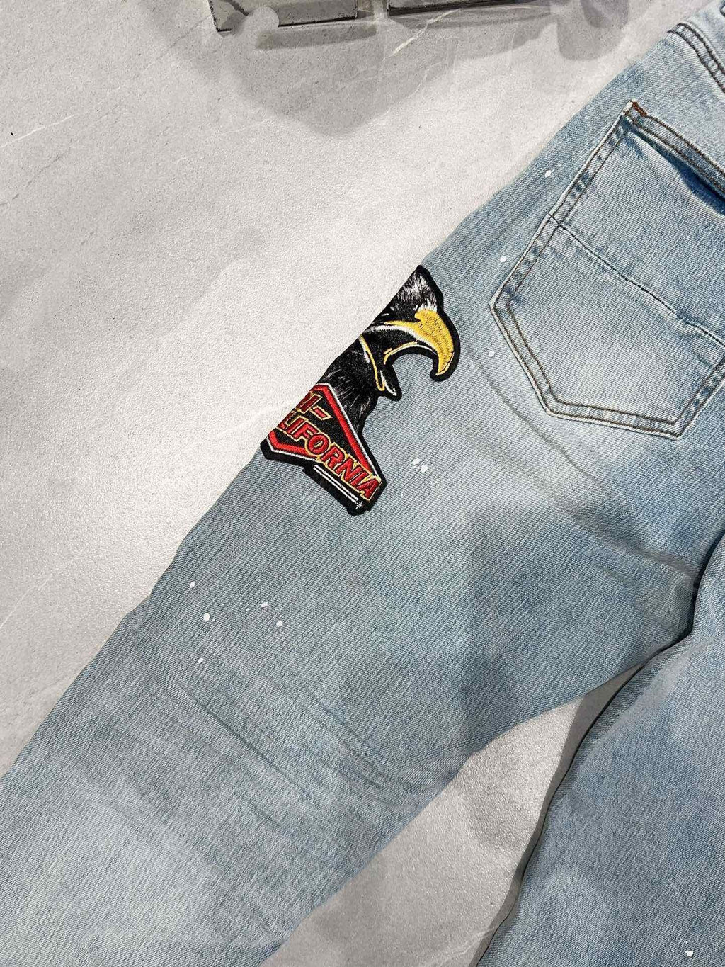 AMIRI DISTRESSED CEMENT CALIFORNIA SKINNY JEANS