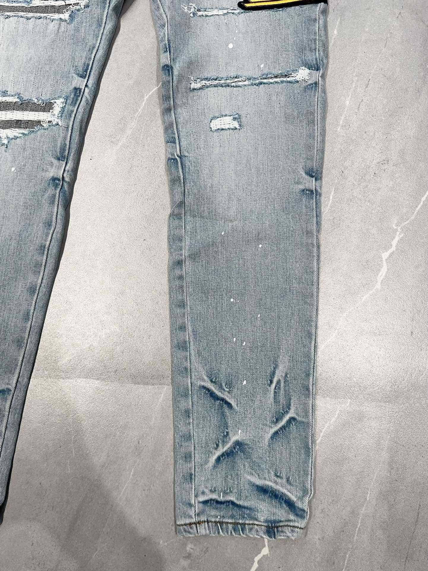 AMIRI DISTRESSED CEMENT CALIFORNIA SKINNY JEANS