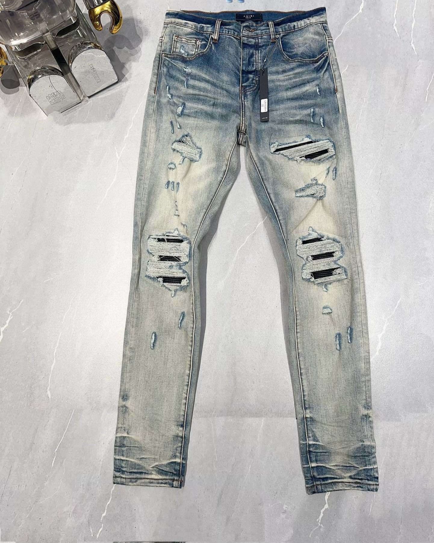 AMIRI MX1 RIPPED SKINNY JEANS
