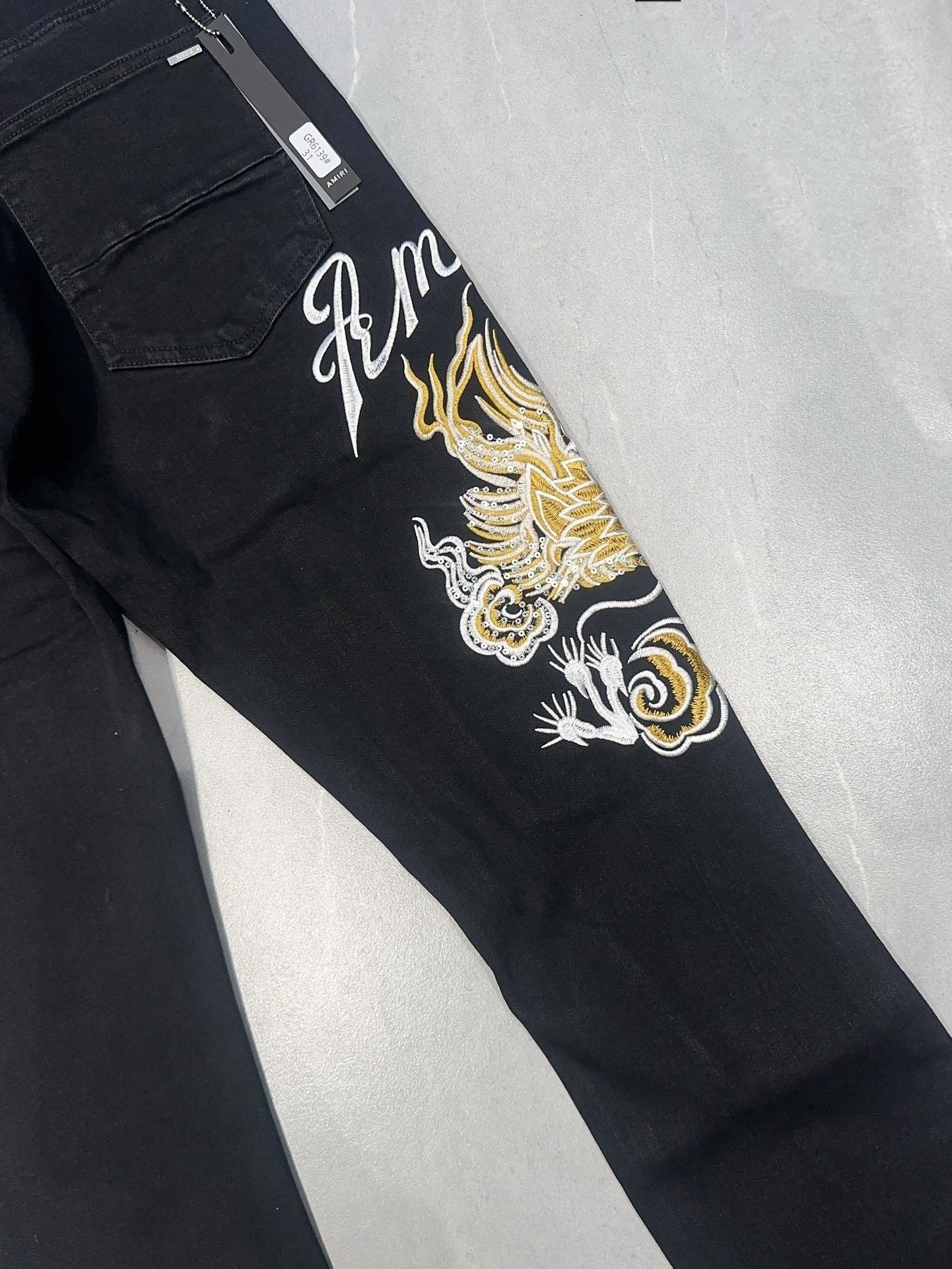 AMIRI DRAGON REPAIR SLIM JEAN
