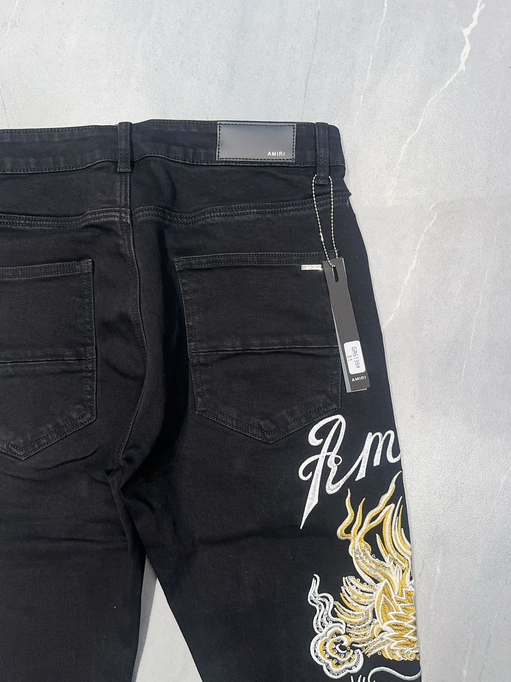 AMIRI DRAGON REPAIR SLIM JEAN