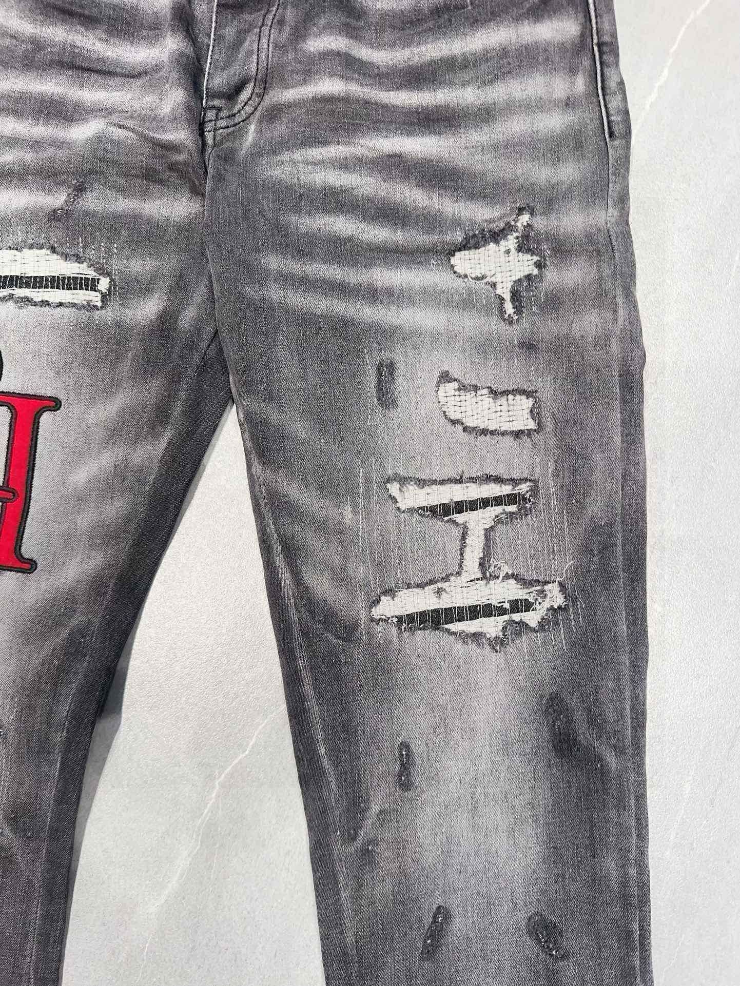 AMIRI DISTRESSED SKINNY JEANS