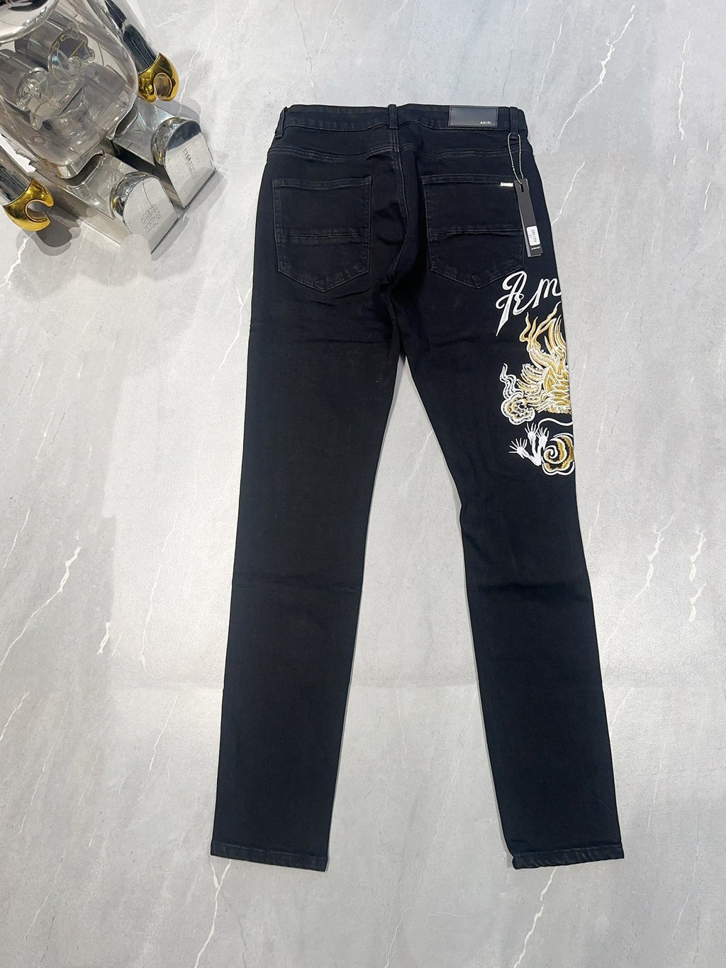 AMIRI DRAGON REPAIR SLIM JEAN